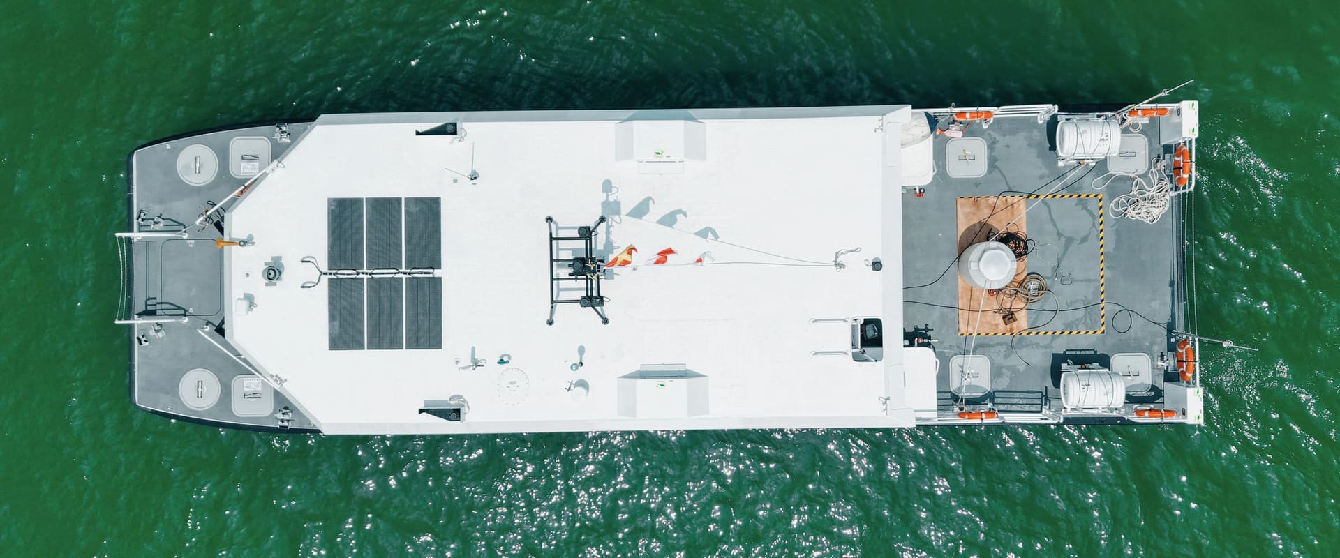 OBLUE E60 electric catamaran from above, rooftop solar array