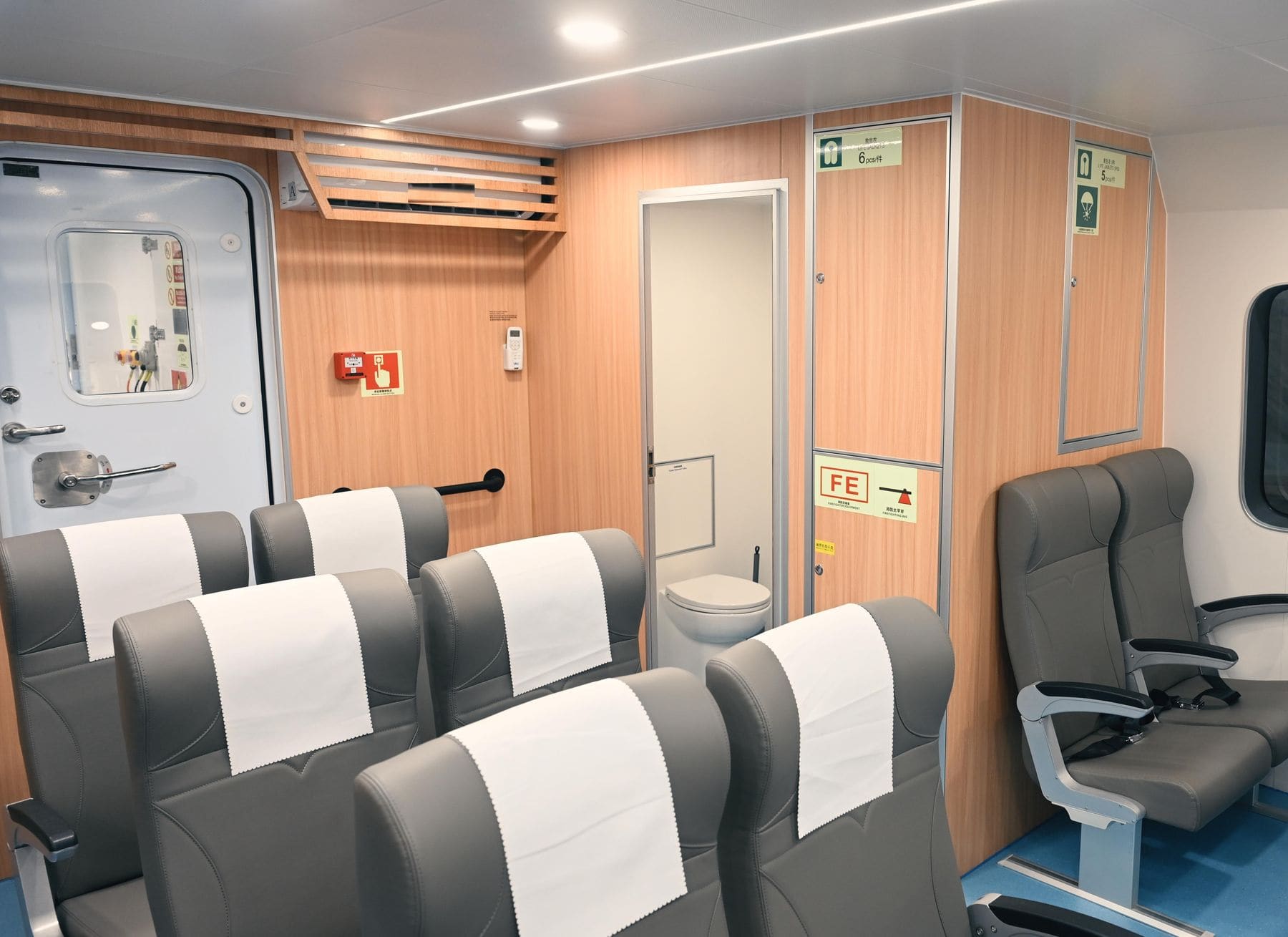 Aft cabin of the OBLUE E60 with W.C. and lockers