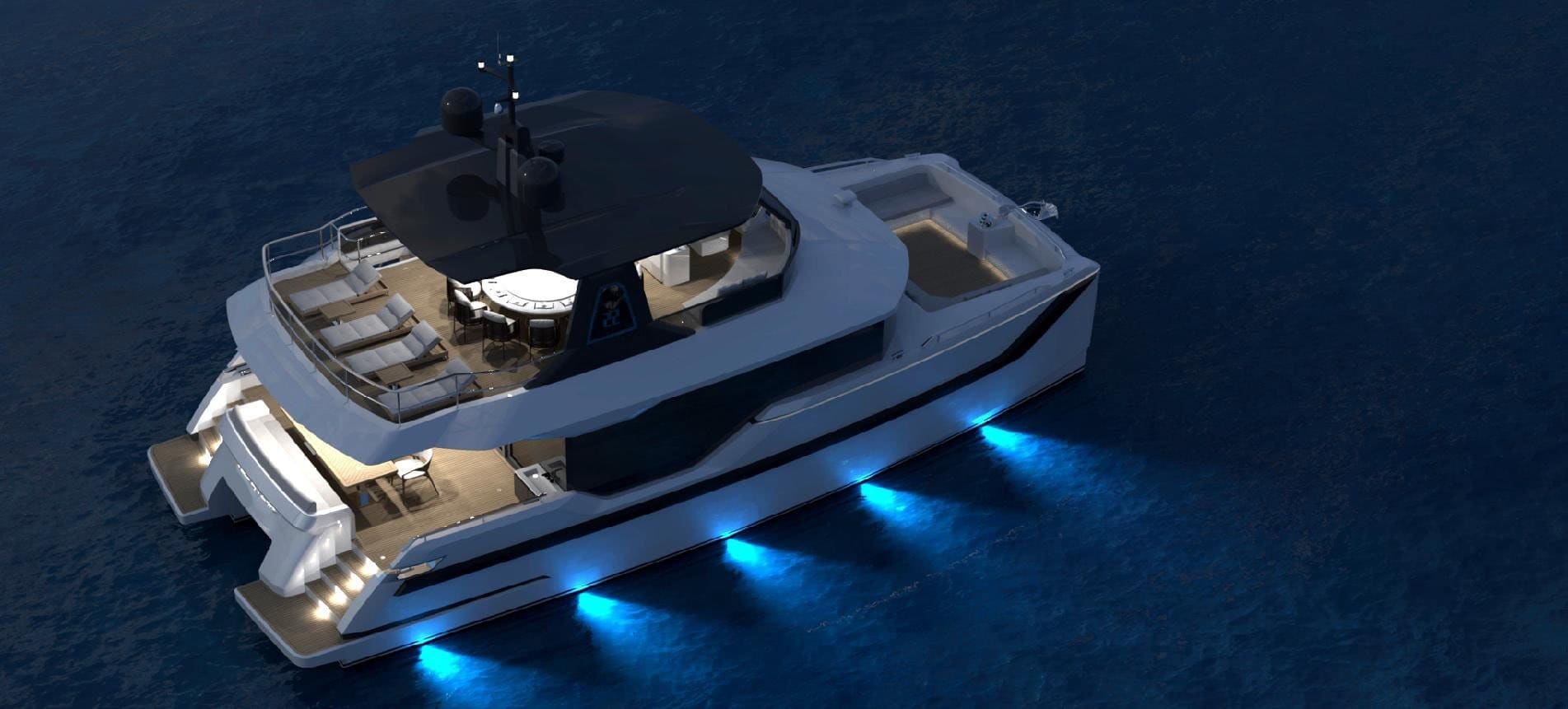 OBLUE 55 at anchor at night with underwater lighting