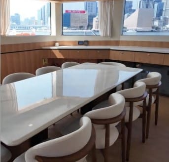 Formal dining table for ten on board the OBLUE 55