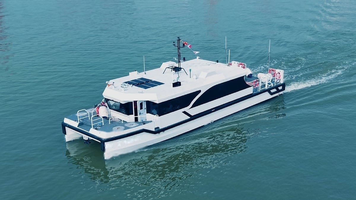 OBLUE SHUTTLE 18E underway, aerial view of the catamaran at service speed