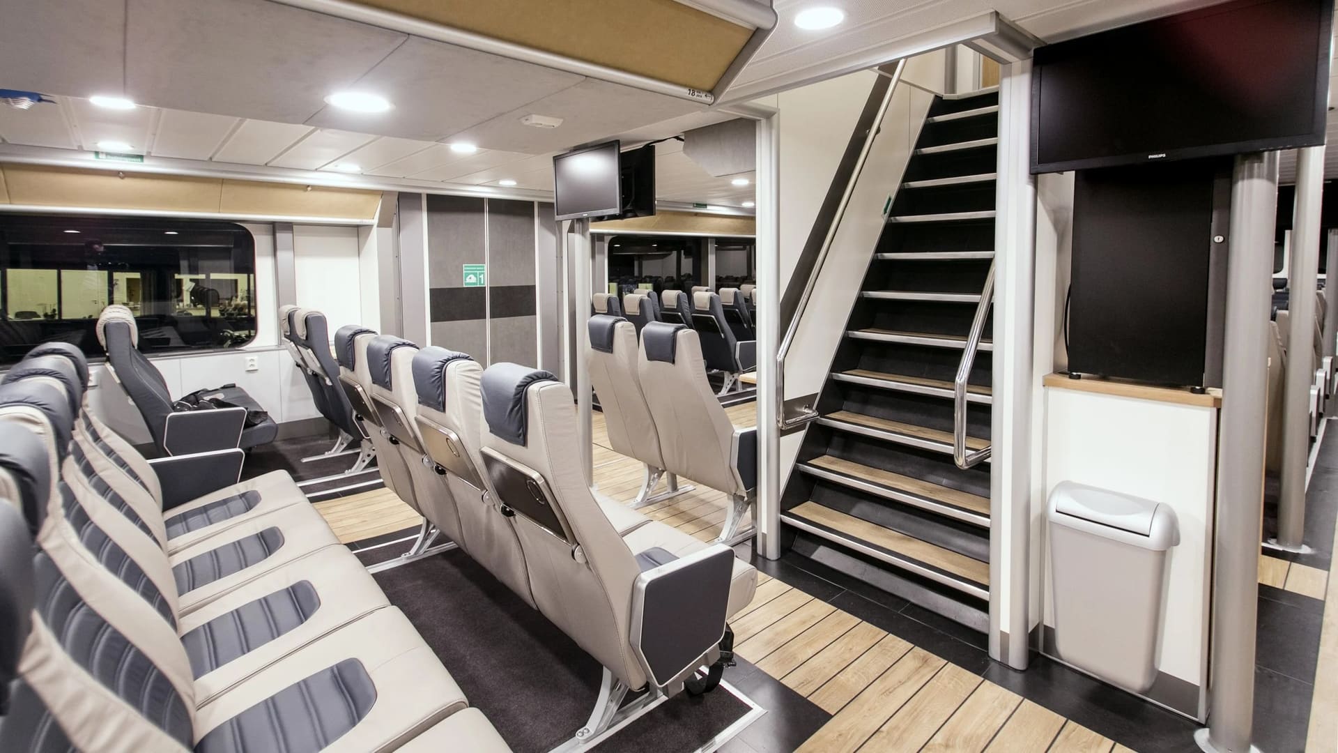 Saloon of the FERRY 32 with the stair to the upper deck